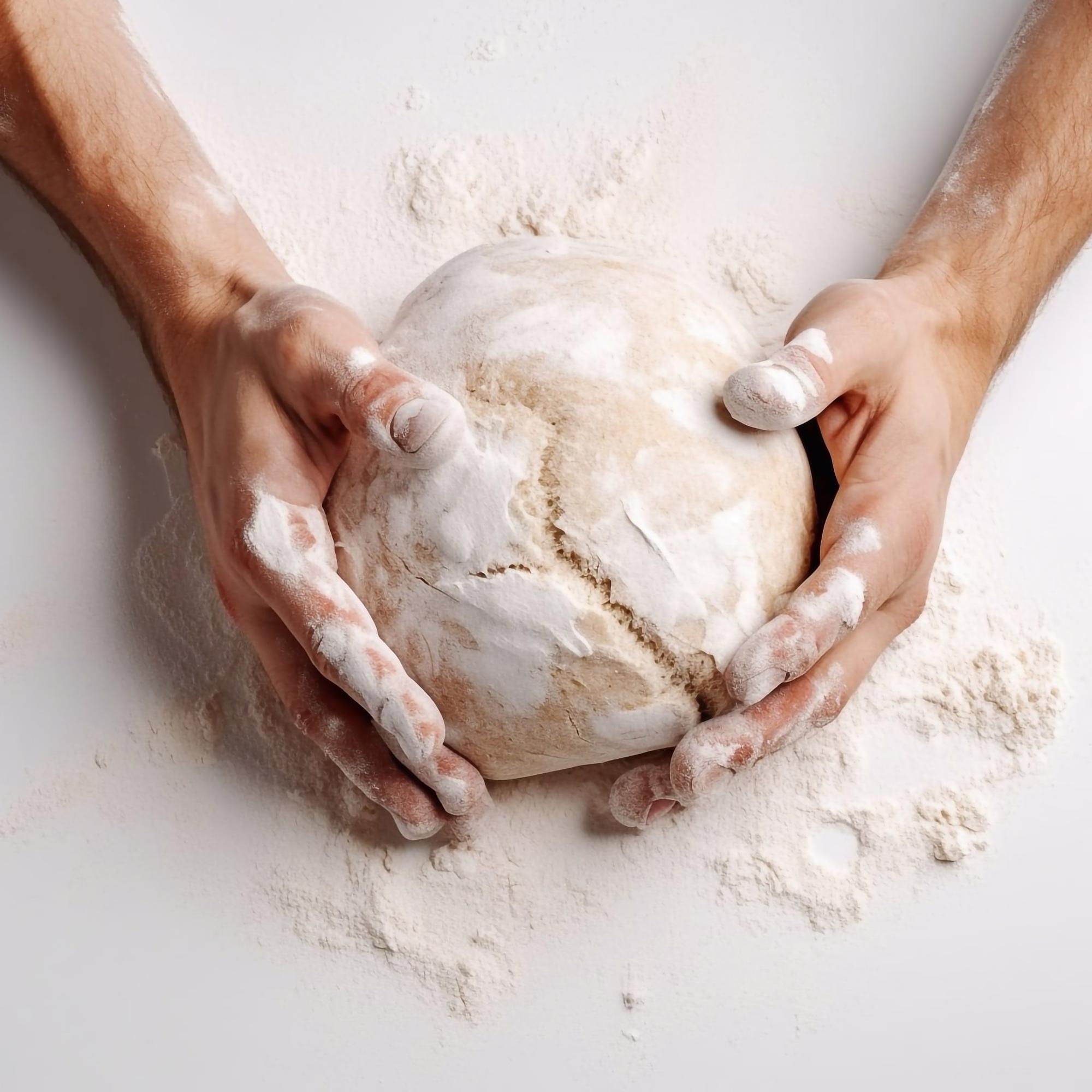 Studente che impasta pane naturale
